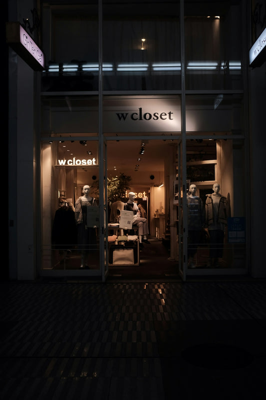 people sitting on chair in front of the coffee shop