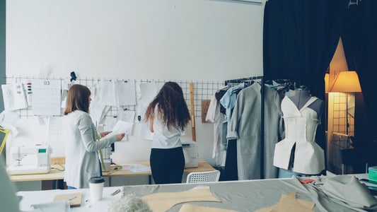 Designers collaborate in a fashion studio.