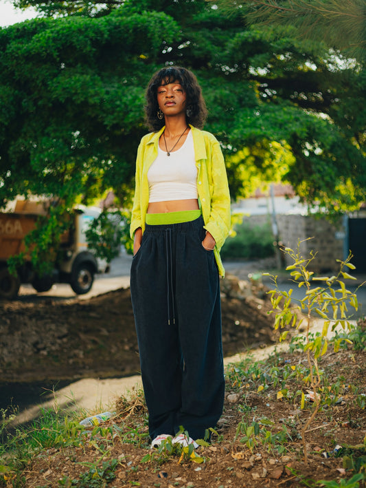 Young woman in casual clothing standing outdoors